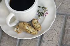 Cup Of Coffee With Biscotti And Flowers Stock Photography Cup Of Coffee With Biscotti And Flowers Stock Photography