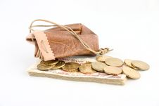 Pouch With Gold Coins And Banknotes. Royalty Free Stock Image