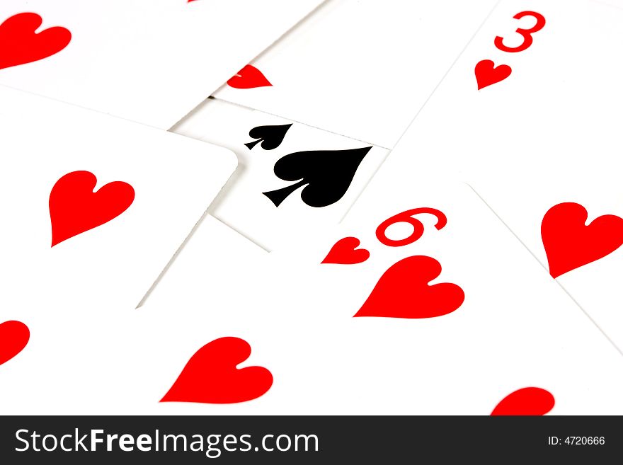 Playing cards with red hearts and one black heart. Playing cards with red hearts and one black heart