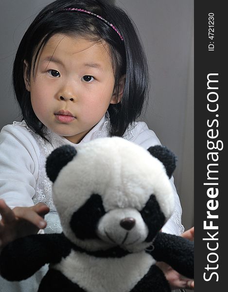 Chinese girl with panda toys