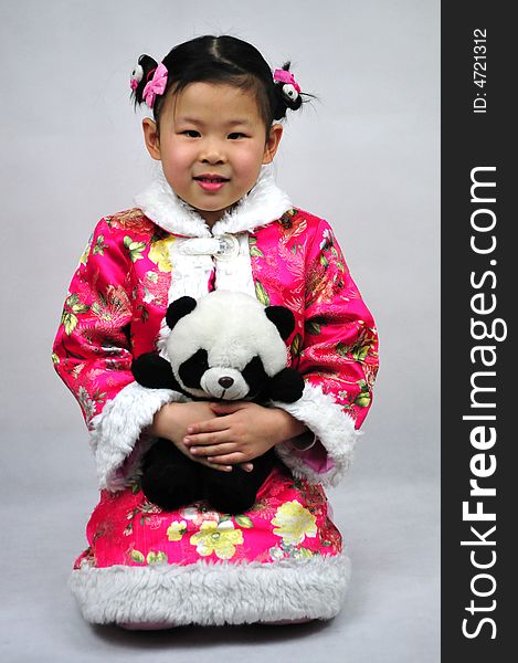 Chinese girl have traditional wear beautiful cloth, happy girl. Chinese girl have traditional wear beautiful cloth, happy girl