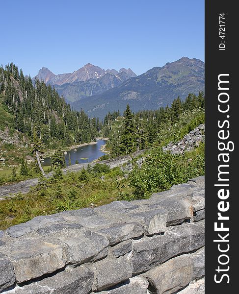 Scenic view of lake, forests, and mountains from Mt Baker National Park in Washington, USA