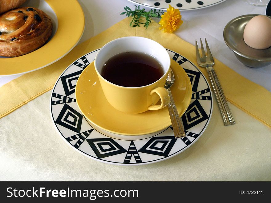 Breakfast table prepared for guests at a bed and breakfast place. Breakfast table prepared for guests at a bed and breakfast place.