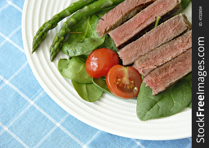Steak with Tomatoes, and Asparagus