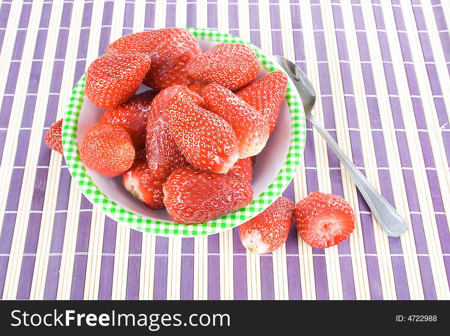 You have fresh strawberries in the bowl