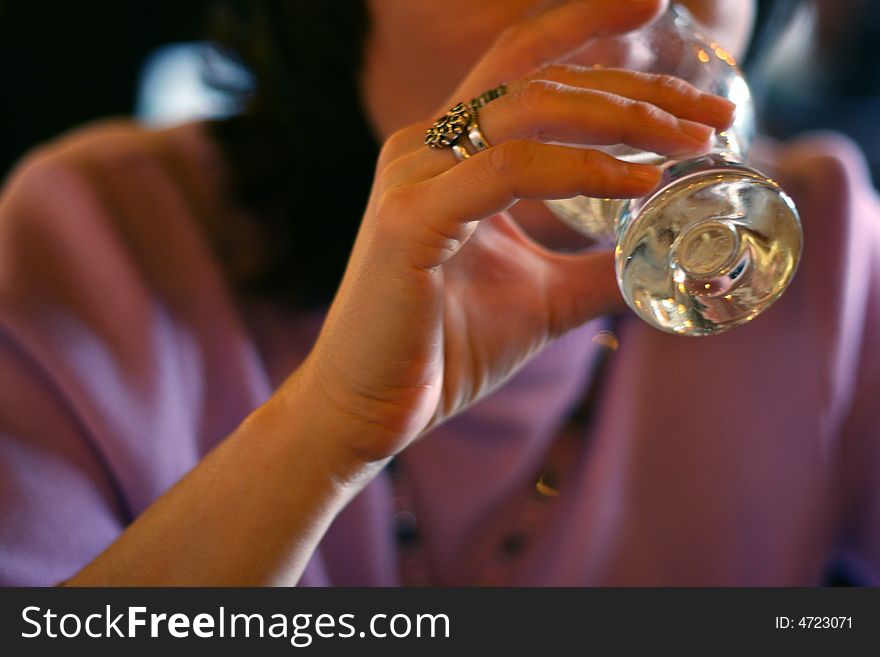 Woman hand holding the glass of vine. Woman hand holding the glass of vine