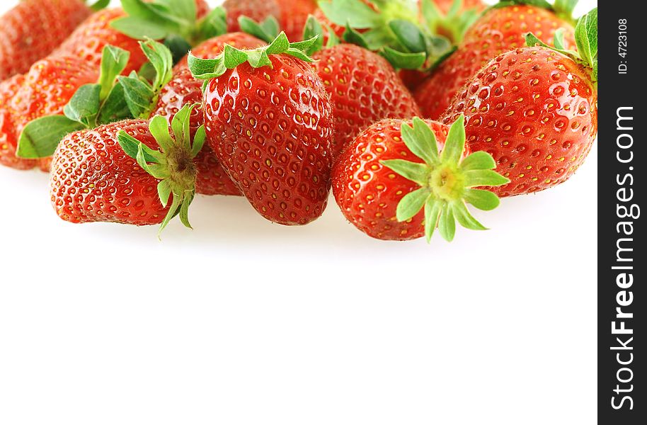 Fresh bright juicy strawberry over white as a background with copy space