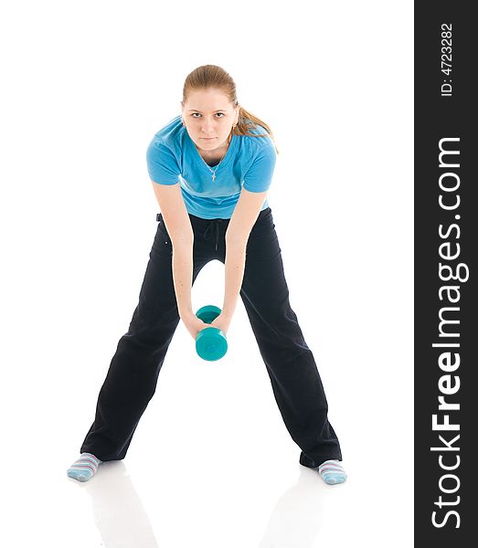 The beautiful young woman doing exercise isolated on a white background