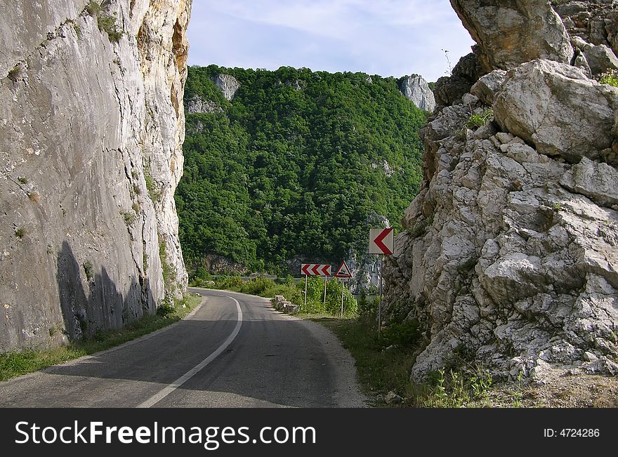 The road of Danube gorge is following the river, for 100 km. In the other side of the river si Serbia country. The road of Danube gorge is following the river, for 100 km. In the other side of the river si Serbia country.