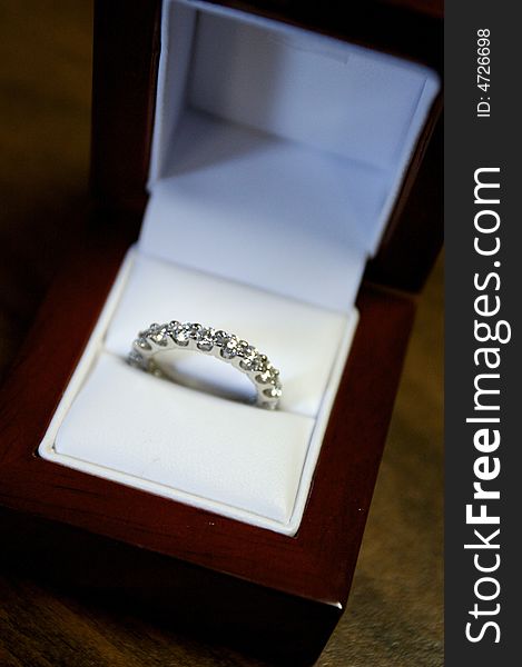 An image of bride's ring in box
