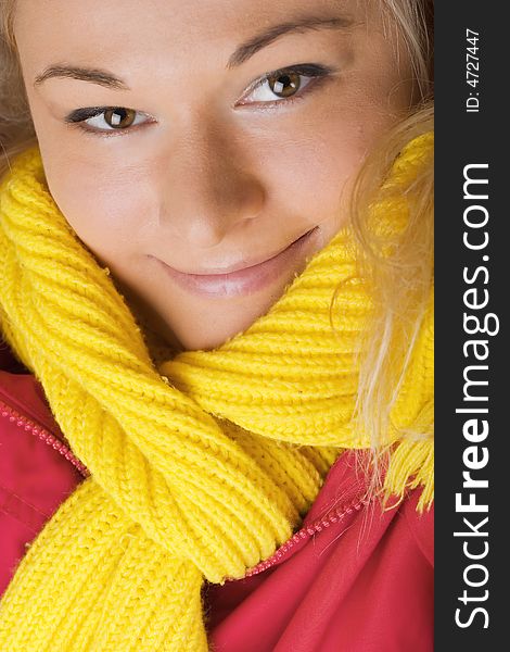 Beautiful female wearing red jacket and yellow scarf. Beautiful female wearing red jacket and yellow scarf