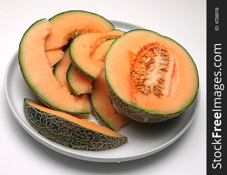 Orange melon with green peel