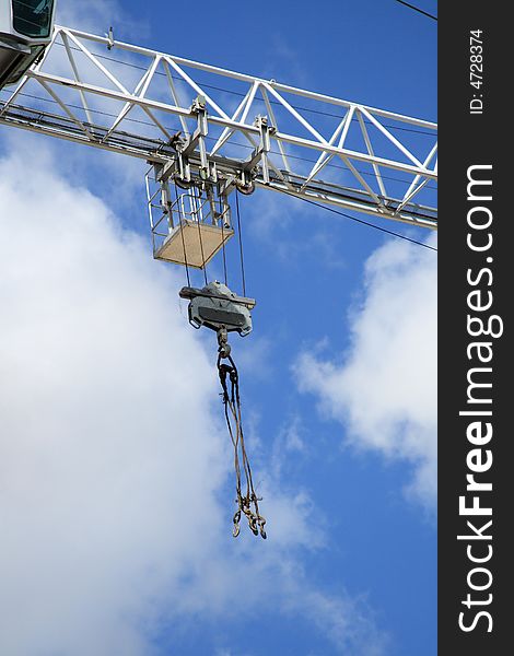 Part of building edge on a background of the dark blue sky with clouds. Part of building edge on a background of the dark blue sky with clouds