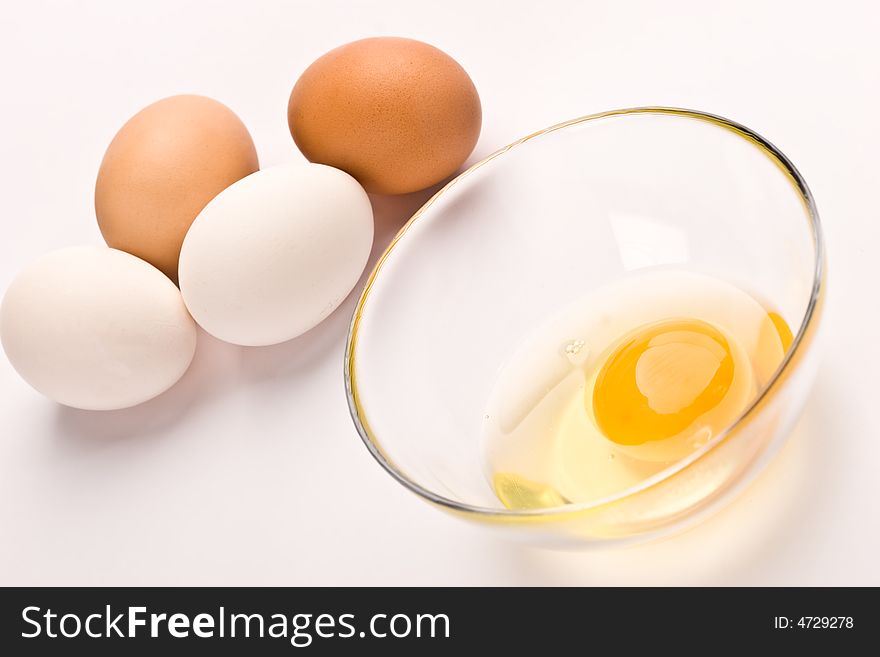 Food serias: two hen's eggs and broked one