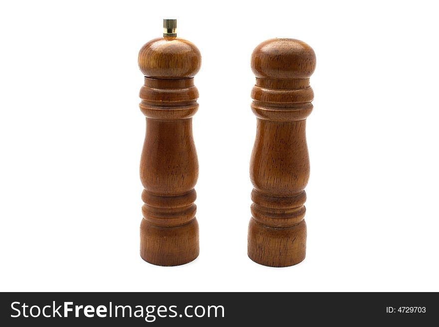 Pepper pot and saltshaker on white background.