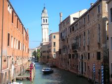 Canal With Falling Bell Tower Royalty Free Stock Images