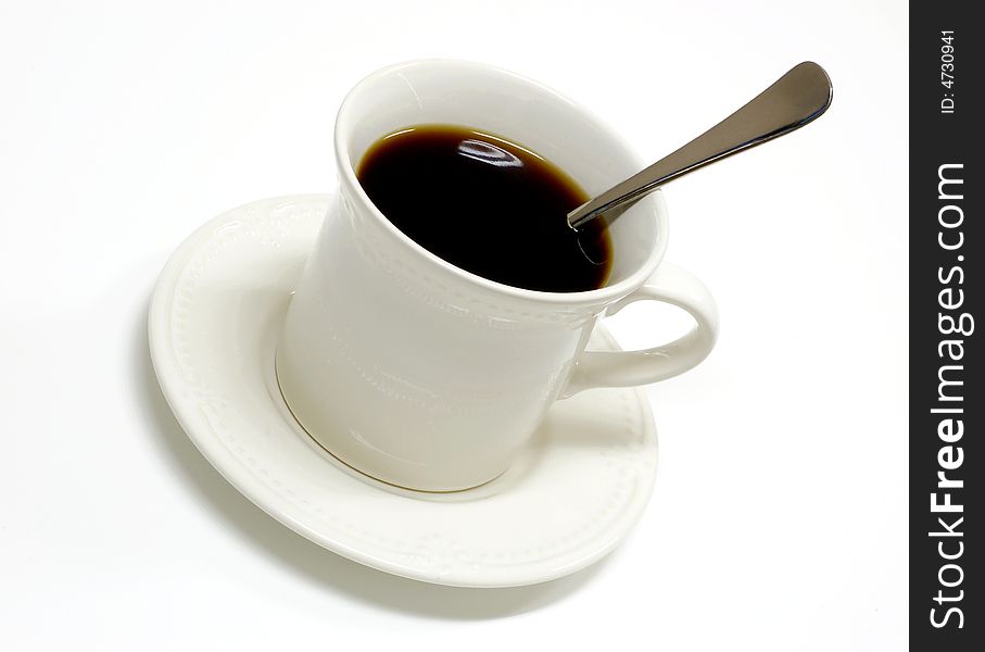 Coffee cup and saucer on a white background. Coffee cup and saucer on a white background