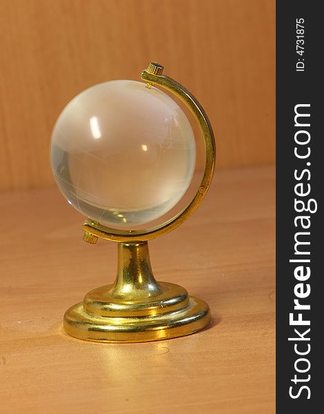 Crystal and Gold Globe paperweight. Crystal and Gold Globe paperweight.