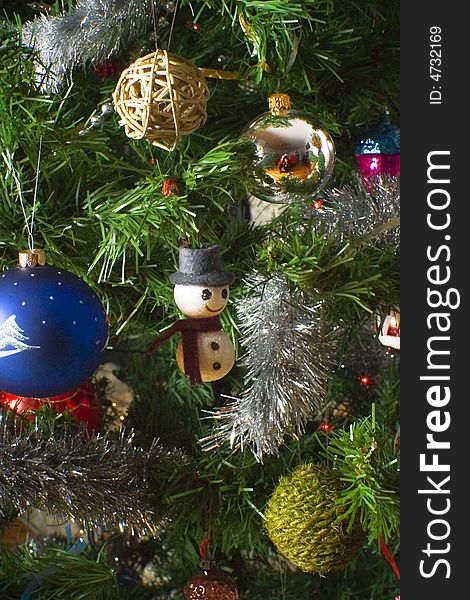 Christmas decorations on tree as a background. Christmas decorations on tree as a background