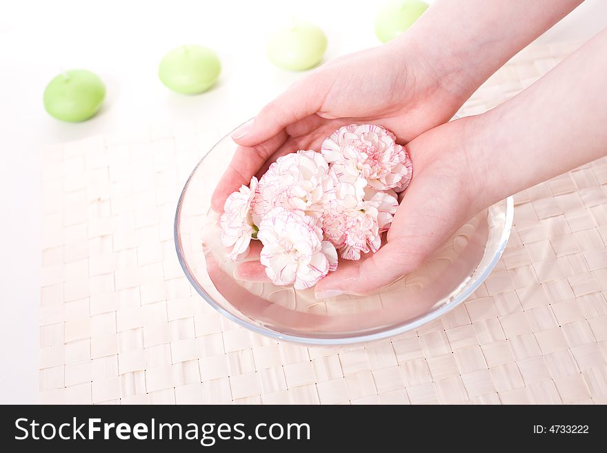 Female Hands In Bowl Full Of Water