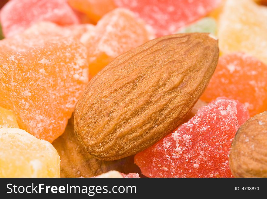 Background from assorted dried fruits and nuts. Close-up.