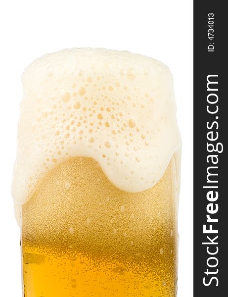 The fresh foamy beer isolated on a white background. Clipping path included.