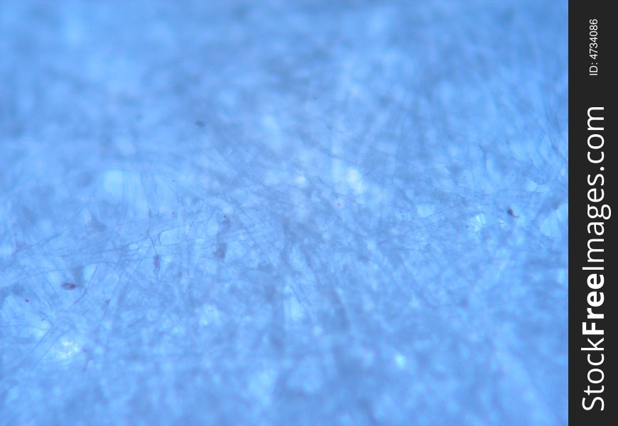 Blue cloth mono-filament under the microscope. Blue cloth mono-filament under the microscope.