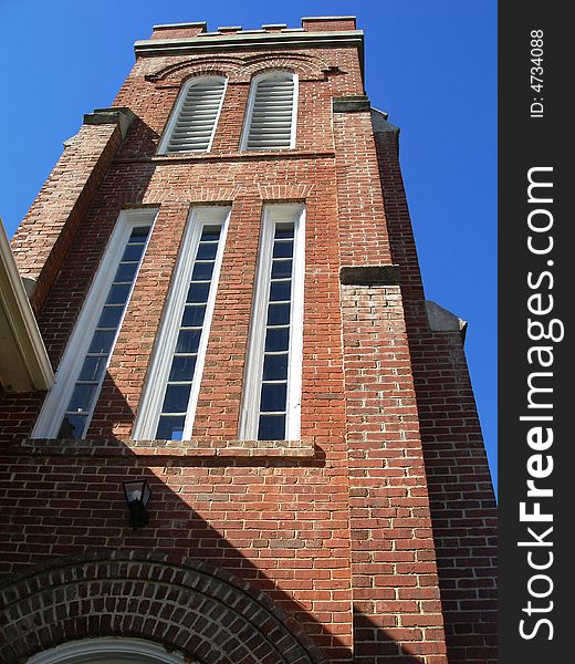 The over-sized bell tower of this early 1900's Church is still operational. The over-sized bell tower of this early 1900's Church is still operational.