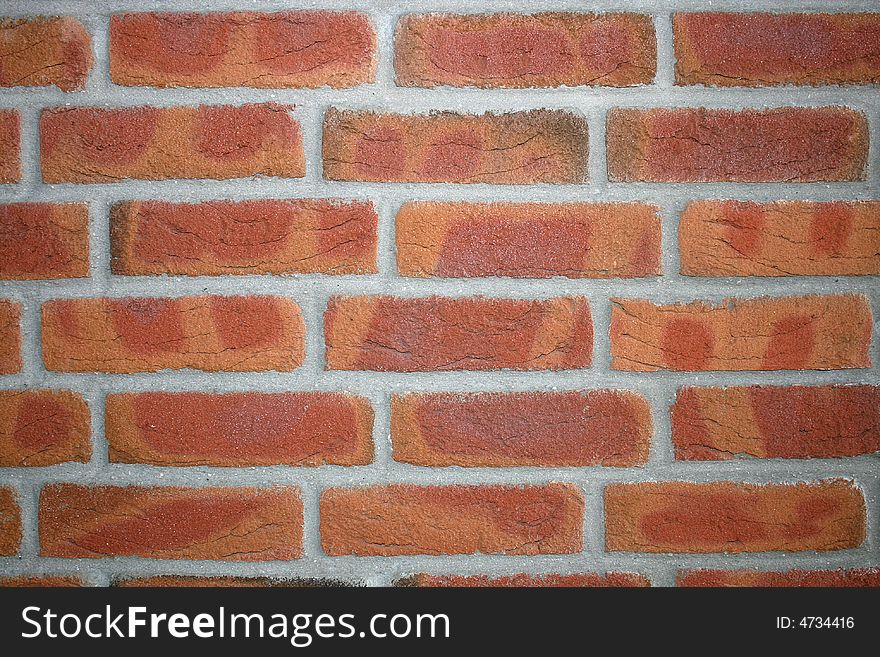 A wall of red bricks. A wall of red bricks