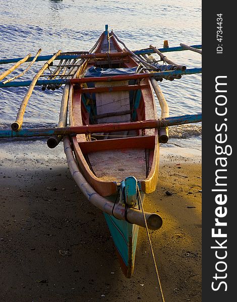 Banca boat on the beach at sunset. Banca boat on the beach at sunset