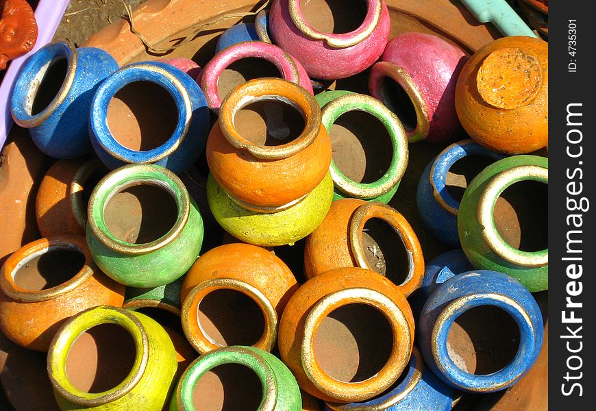 Stock of colored pots displayed into the market. Stock of colored pots displayed into the market