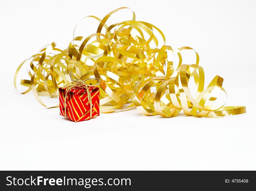 Christmas decoration - golden ribbon and small present