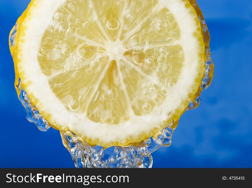 Refreshing lemon against the blue sky