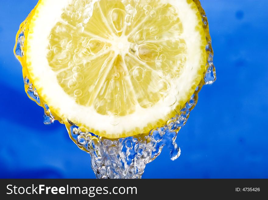 Refreshing lemon against the blue sky