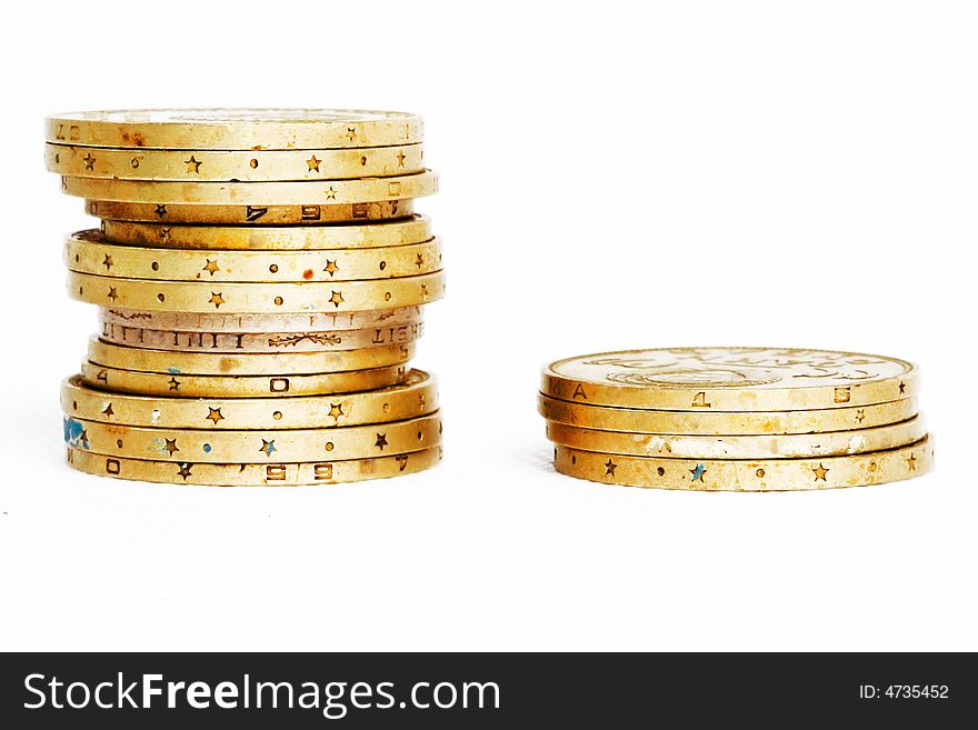 Golden coins isolated on white