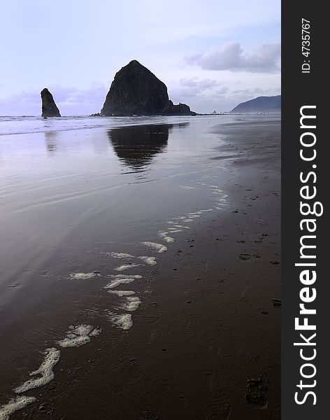 Cannon Beach at Oregon Coast in late afternoon. Cannon Beach at Oregon Coast in late afternoon