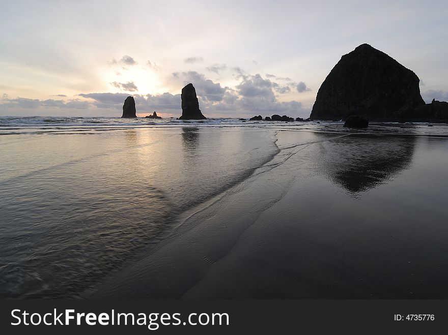 Cannon Beach at Oregon Coast in late afternoon. Cannon Beach at Oregon Coast in late afternoon