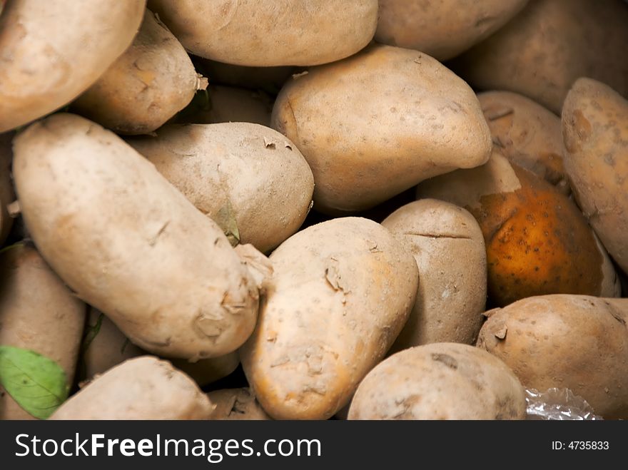 Asian market vegetables, closeup of potatoes