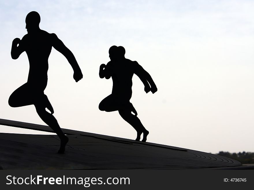 Conceptual photo about sportsmen running. Conceptual photo about sportsmen running