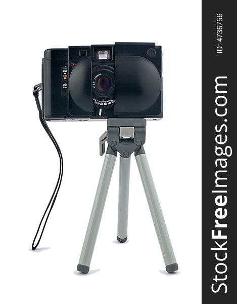Mini tripod with compact camera isolated on white. Mini tripod with compact camera isolated on white