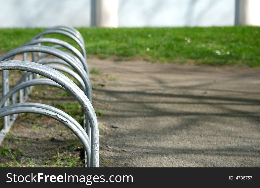 Just an empty bicycle stand. Just an empty bicycle stand