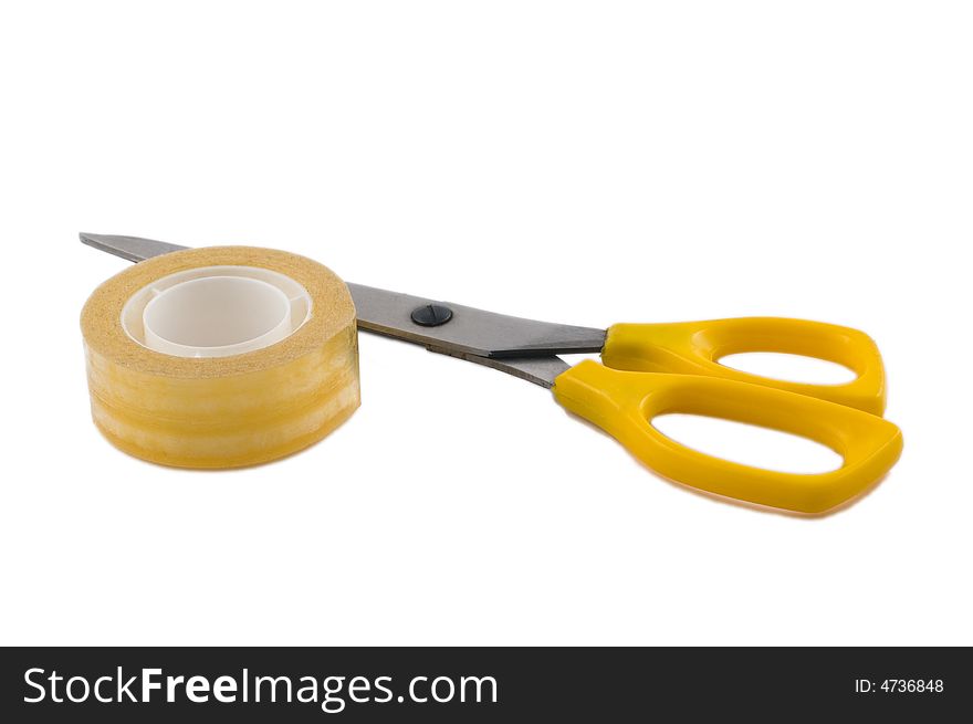Tape and scissors isolated on white