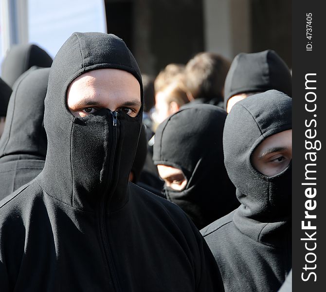 Masked football fans in Romania