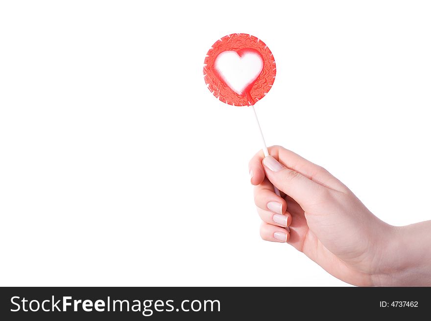 I give You my heart :) / female hand with lollipop / copyspace