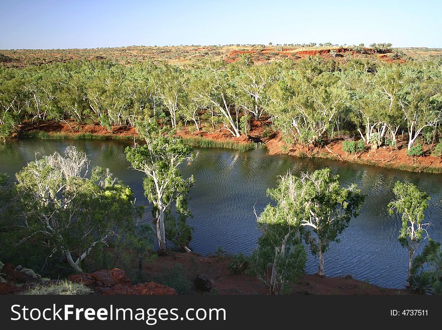 Beautiful Australian landscape. Shot of a river with surrounded forest. Beautiful Australian landscape. Shot of a river with surrounded forest.