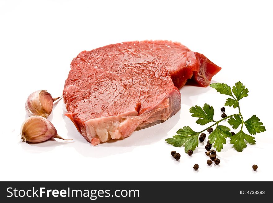 Food serias: raw fresh meat with garlic and parsley. Food serias: raw fresh meat with garlic and parsley