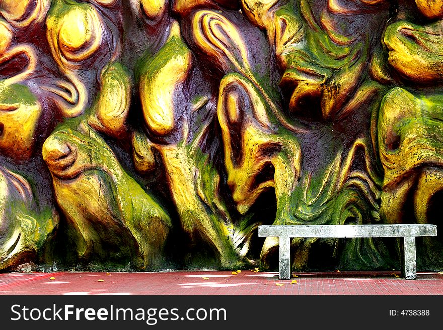 A single stone bench with an abstract background. A single stone bench with an abstract background