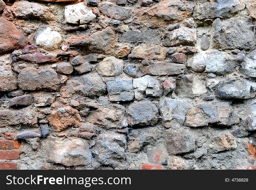 Old stone wall and bricks. Old stone wall and bricks