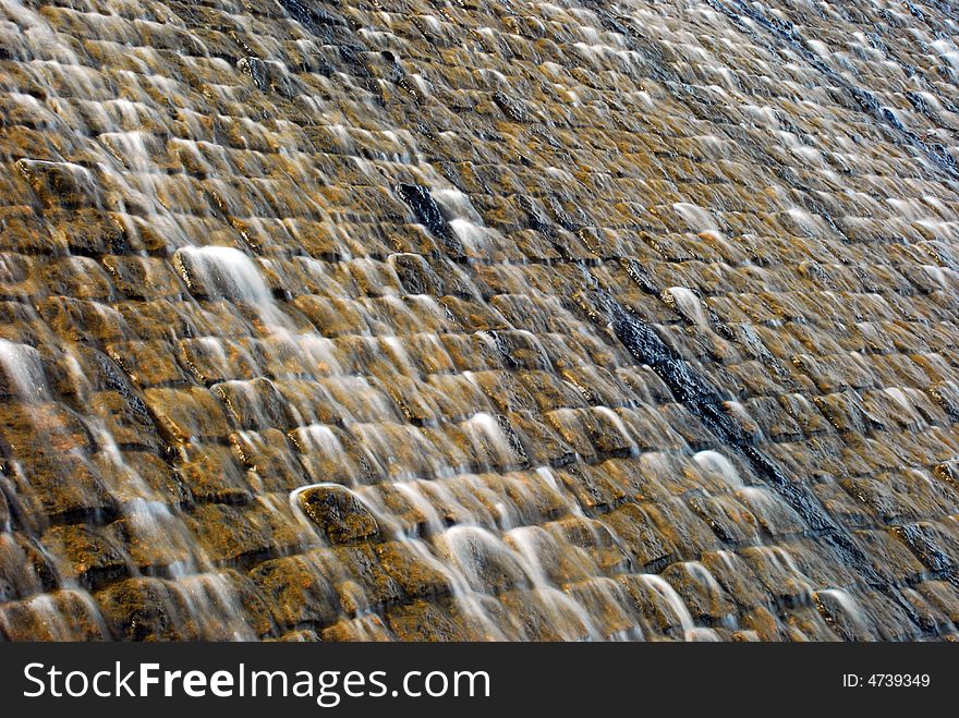 Great manmade waterfall with stones and rocks