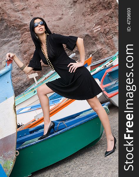 Fashion Girl Between Boats